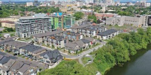 Intensification evident in this photo of Greystone Village, along with infrastructure enhancements of the complete Main Street and the Flora Footbridge, make Old Ottawa East a model for City of Ottawa planners. Photo by James Ramsey/Skytography Photo