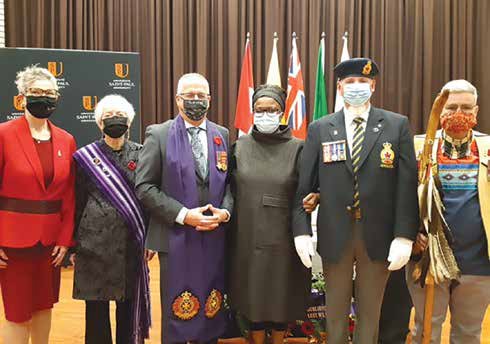 Saint Paul University’s Remembrance Day Ceremony - L to R: Chantal Beauvais, University Rector; Marie-Louise Perron, Knowledge Keeper; Chaplain-Colonel (Retired) Sylvain Maurais, CD ; Anne-Marie Habyalimana, Coordinator of Pastoral Services; Sharp Dopler CD Lt. (Navy) Retired, alumni; and Mizel Gauthier, Knowledge Keeper. Photo Supplied