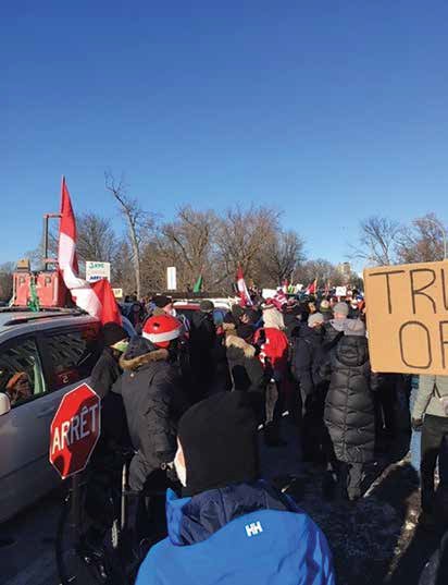 Many local residents joined with other Ottawans along Riverside Drive on February 13th in the anti-convey protest against the three week-long occupation of our City by groups opposed to COVID restrictions. Photo by Jeff Sutton