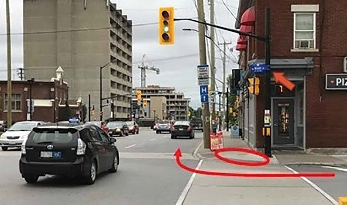 Four years ago, the City’s Main Street Safety Audit described the risks to safety at the southwest corner of Main Street and Hawthorne Avenue as “extreme” but the new design for the corner still provides no additional space for pedestrians and cyclists. Image by City of Ottawa