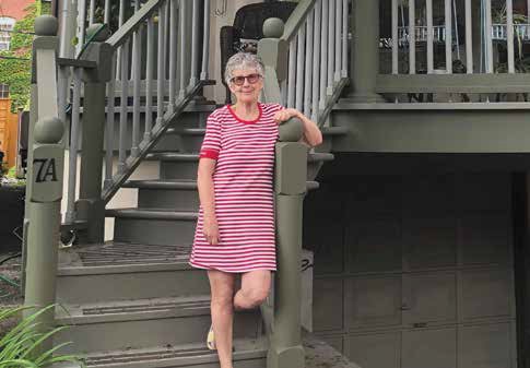 Old Ottawa East resident and artist, Louise Rachlis, is pictured outside her home. Photo Supplied 
