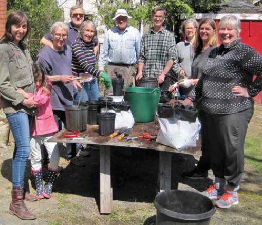 Members of SLOE's Adopt-A-Tree program gather at a "potting party". Photo Supplied