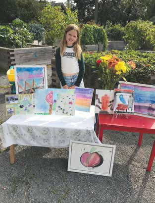 Camille (9) was so excited about her first sale. Photo by Lori Gandy