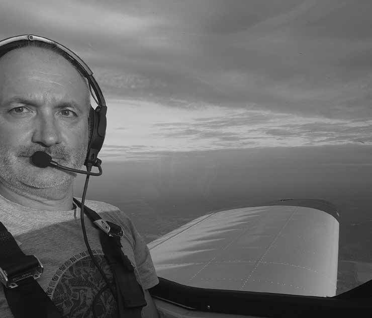 Penna is pictured at the helm high above the Smith's Falls staging and training area where he will be finishing his test flights of the DIY aircraft. Photo Supplied