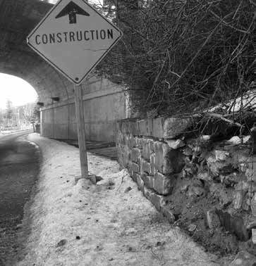 Parts of the crumbling retaining wall between Colonel By Drive and Echo will be rehabilitated next summer. Photo by John Dance