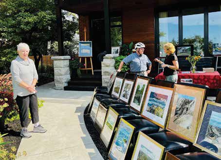 Artist Ruth Browning exhibited her exquisite paintings for the third consecutive year at the picturesque front yard on Echo Drive. Photo Supplied 