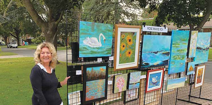 First-time exhibitor, artist Rose Marie Roy, teamed up with fellow painter Chris Kingsley to extend the outdoor art tour to Rideau Garden Drive. Photo by Lorne Aboguv